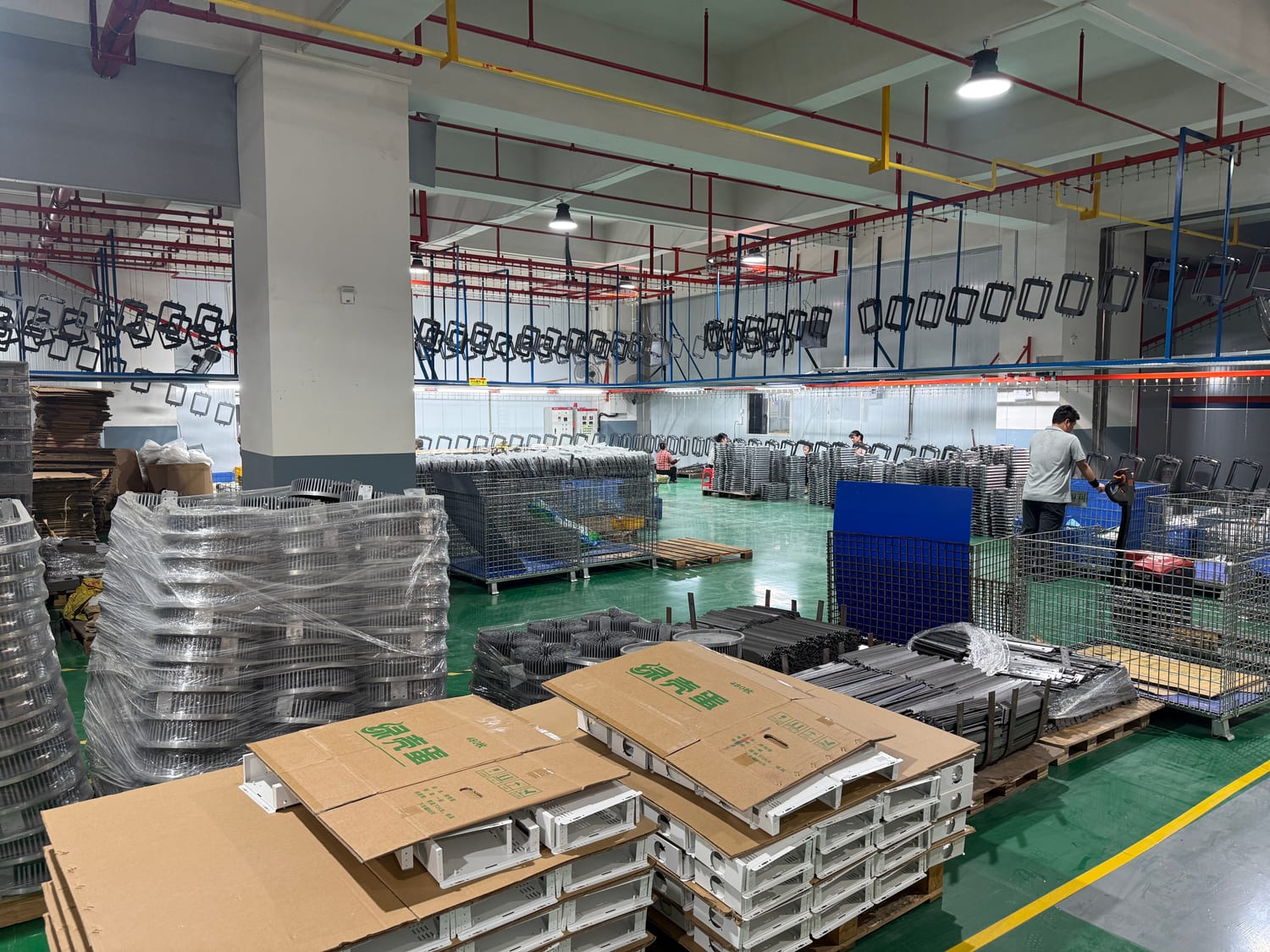 Metal goods staged on the floor, ready to crate